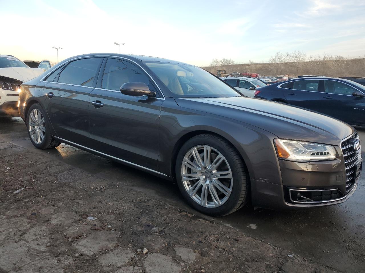 2015 Audi A8 VIN WAU32AFD9FN032185 Copart auction photo, rear end damage thumbnail 4
