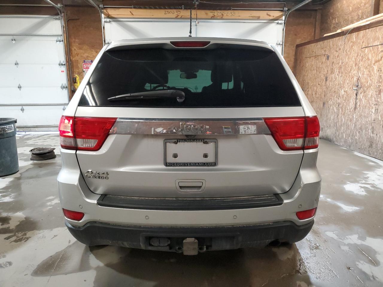 2012 Jeep Grand Cherokee VIN 1C4RJFAG2CC156904 Copart auction photo, front end / side damage thumbnail 6