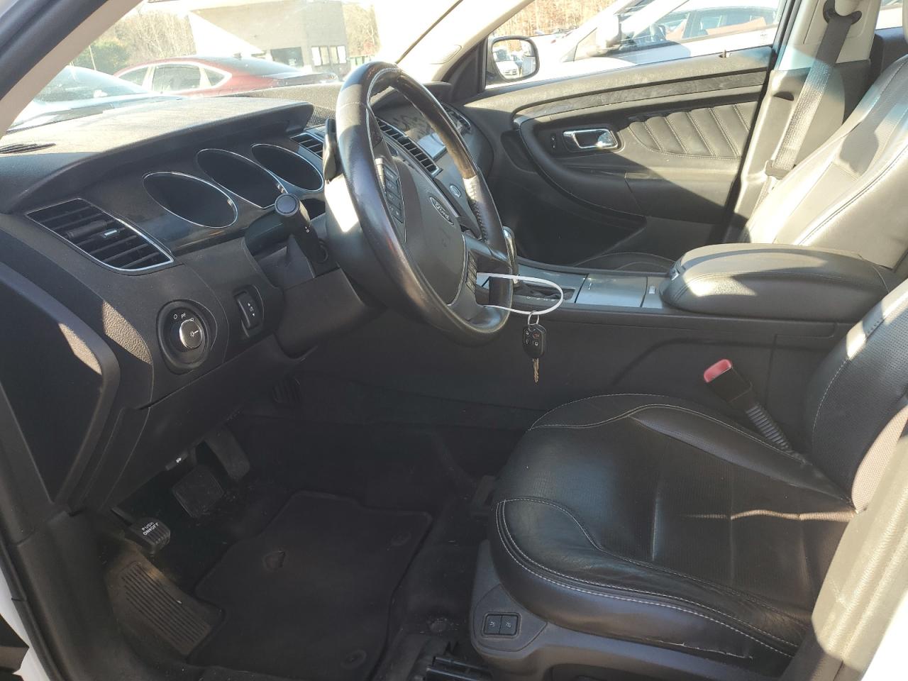 2012 Ford Taurus VIN 1FAHP2FW9CG100993 Copart auction photo, front end / minor dent/scratches damage thumbnail 7