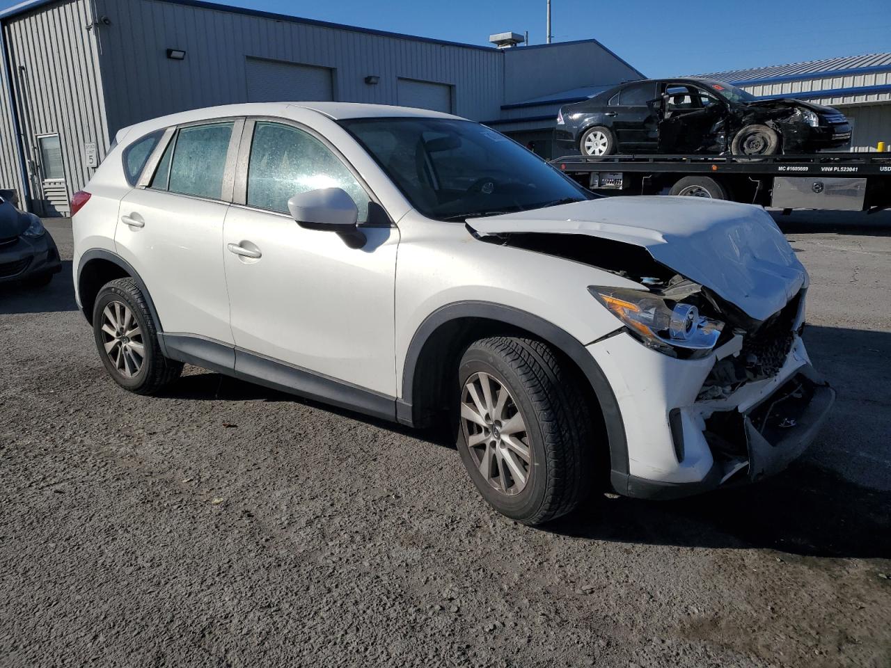 2013 Mazda CX-5 VIN JM3KE2BE5D0134059 Copart auction photo, front end / side damage thumbnail 4