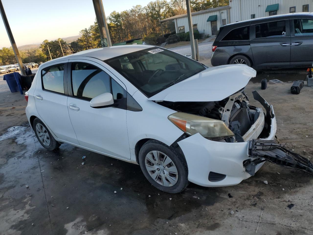 2012 Toyota Yaris VIN JTDKTUD32CD516840 Copart auction photo, front end damage thumbnail 4