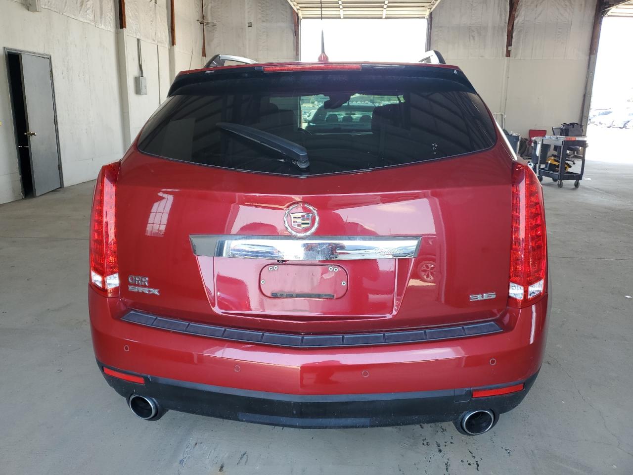 2012 Cadillac SRX VIN 3GYFNAE39CS645967 Copart auction photo, side / front end damage thumbnail 6