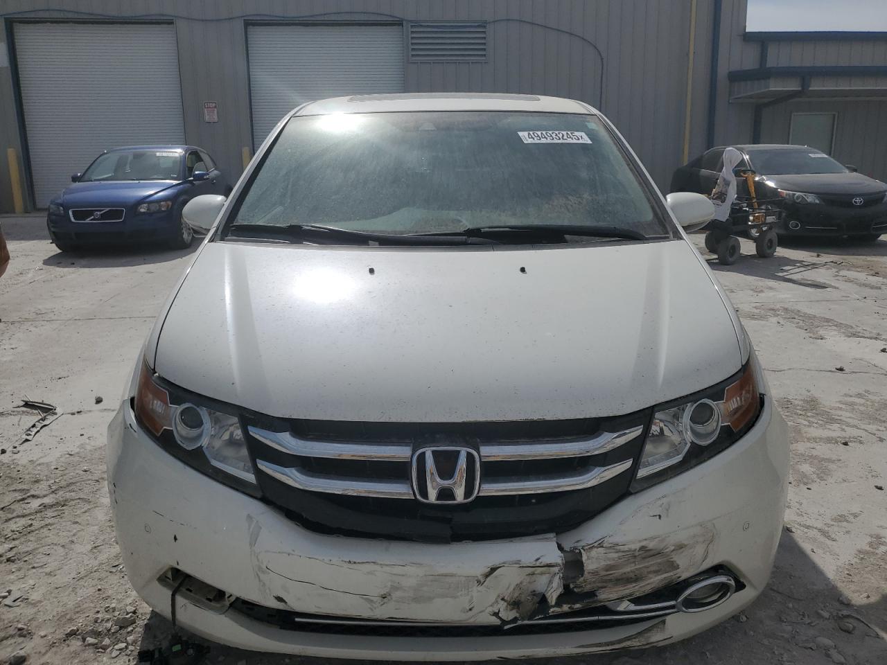 2014 Honda Odyssey VIN 5FNRL5H97EB083997 Copart auction photo, front end / minor dent/scratches damage thumbnail 5