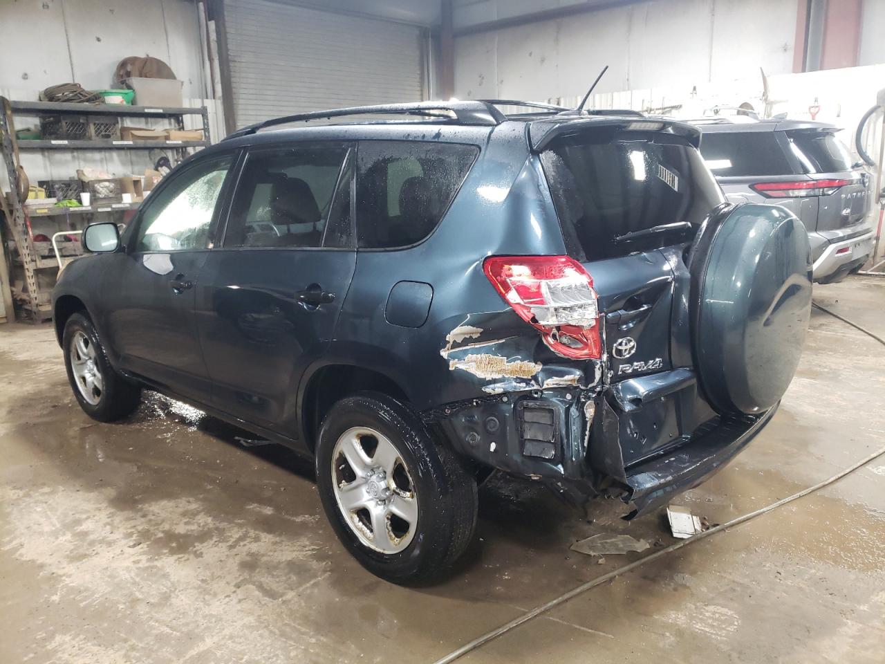 2009 Toyota RAV 4 VIN JTMZF33V895004652 Copart auction photo, rear end damage thumbnail 2