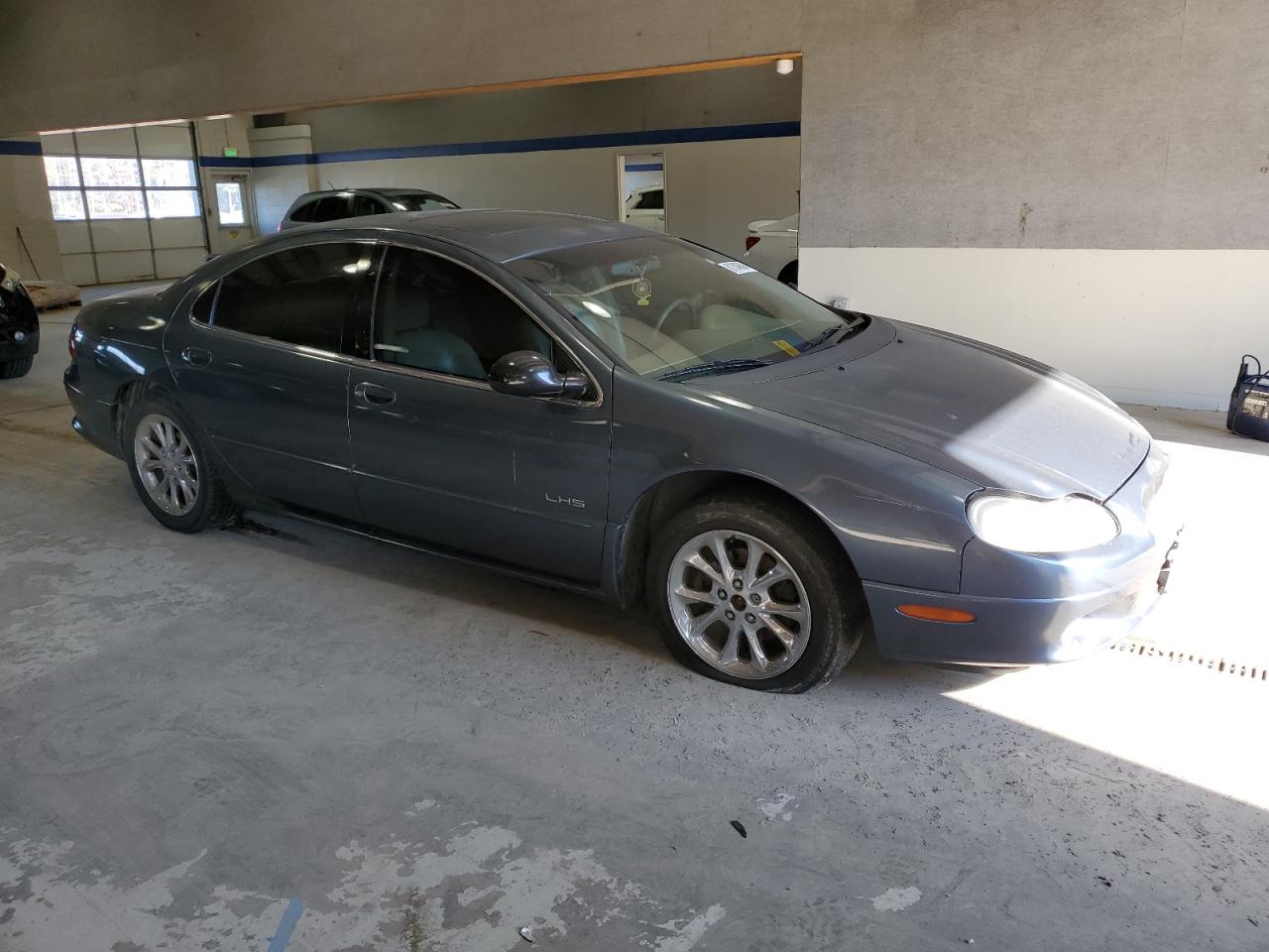 2000 Chrysler LHS VIN 2C3HC56G4YH359861 Copart auction photo, side damage thumbnail 4