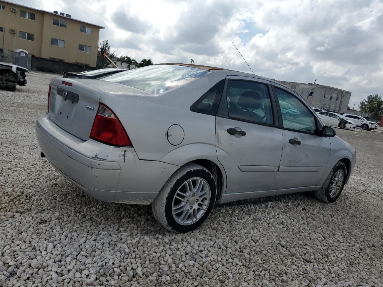 2006 Ford Focus VIN 1FAFP34N86W225131 Copart auction photo, side / minor dent/scratches damage thumbnail 3