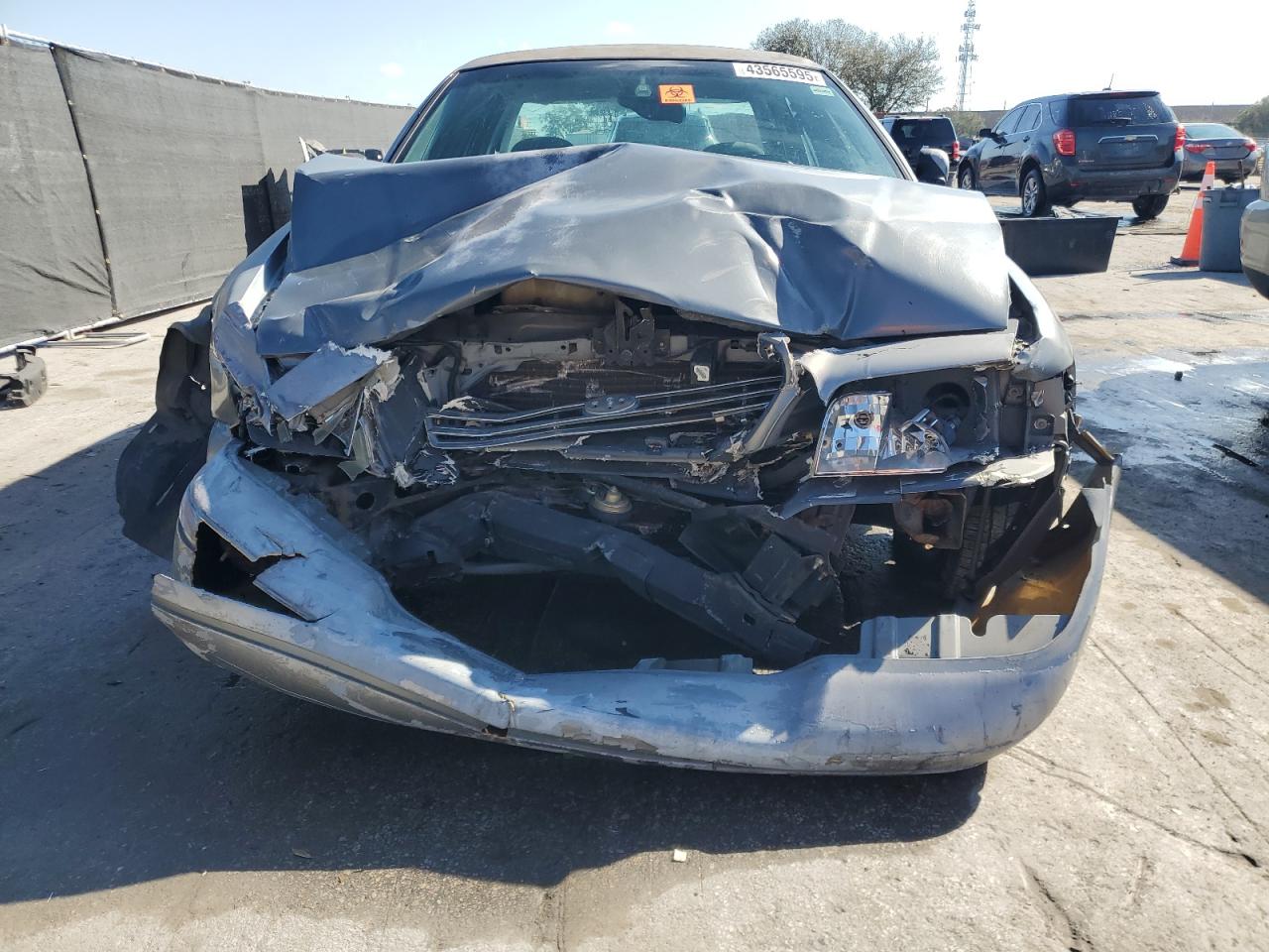 1999 Ford Crown Victoria VIN 2FAFP74W6XX235761 Copart auction photo, front end / side damage thumbnail 5
