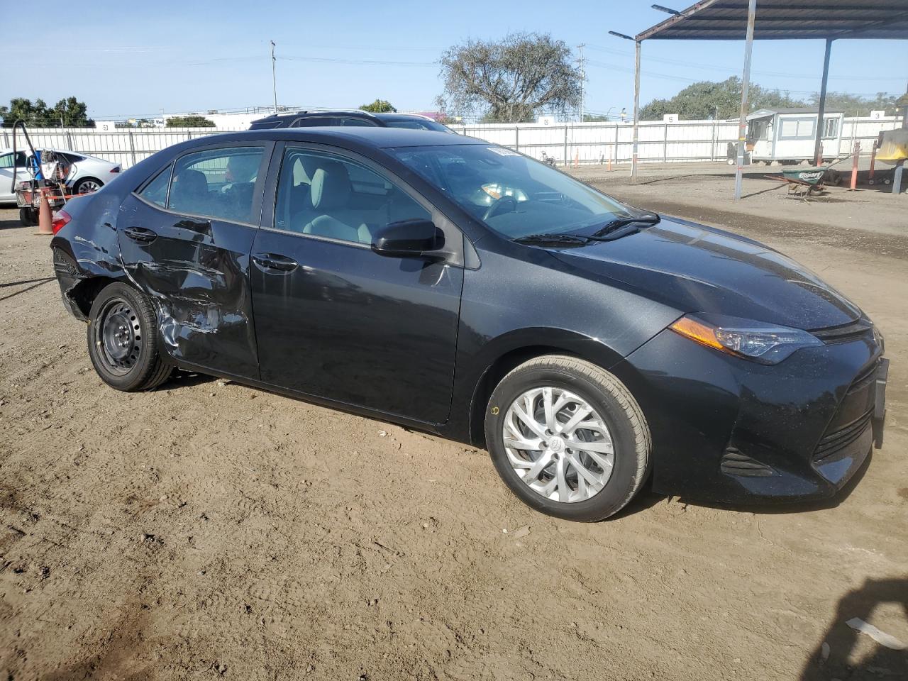 2019 Toyota Corolla VIN 5YFBURHE3KP912275 Copart auction photo, side / rear end damage thumbnail 4