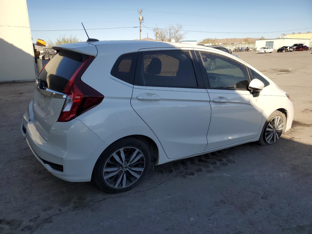 2019 Honda Fit VIN 3HGGK5H83KM725089 Copart auction photo, side / rear end damage thumbnail 3