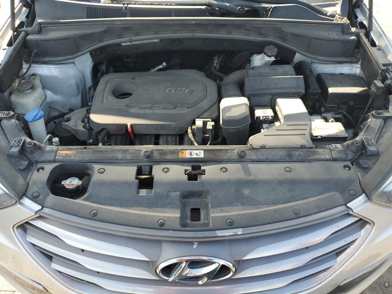 2017 Hyundai Santa Fe VIN 5XYZU3LB0HG415500 Copart auction photo, burn - interior damage thumbnail 12