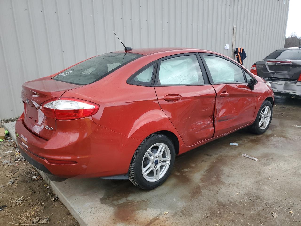 2019 Ford Fiesta VIN 3FADP4BJ0KM158757 Copart auction photo, side damage thumbnail 3