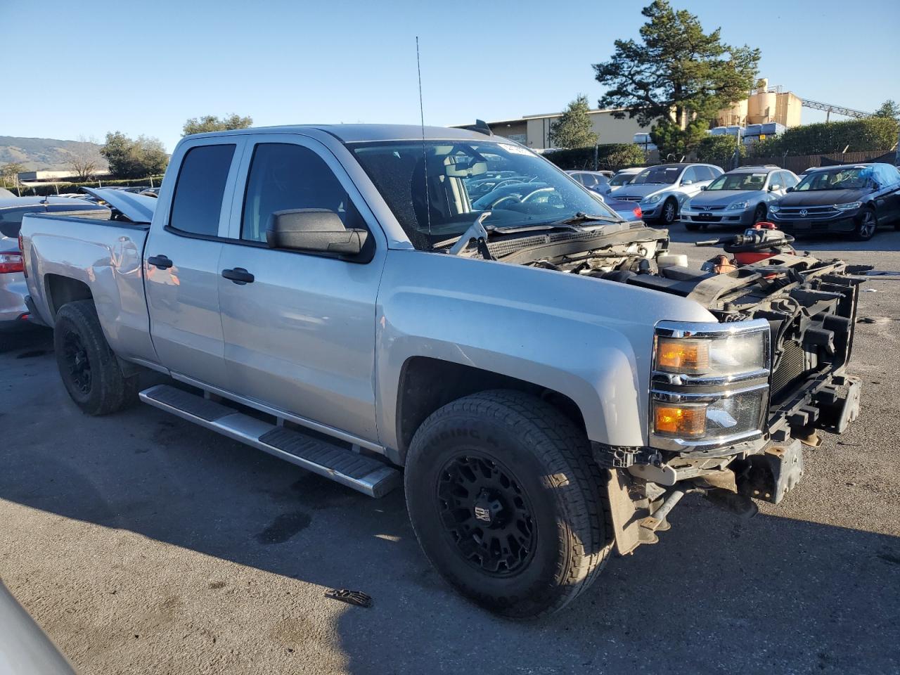 2015 Chevrolet Silverado VIN 1GCRCPEH5FZ157937 Copart auction photo, front end / side damage thumbnail 4