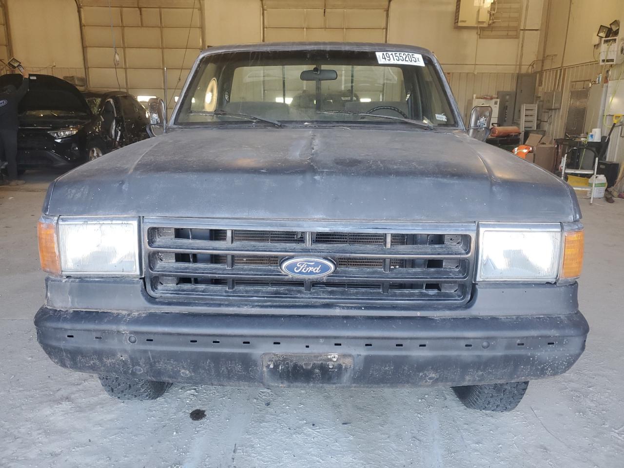 1991 Ford F-150 VIN 1FTEF14N2MLA69468 Copart auction photo, minor dent/scratches damage thumbnail 5
