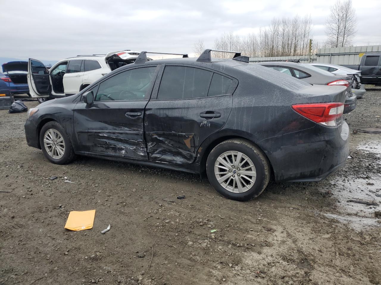 2017 Subaru Impreza VIN 4S3GKAD63H3619912 Copart auction photo, side damage thumbnail 2