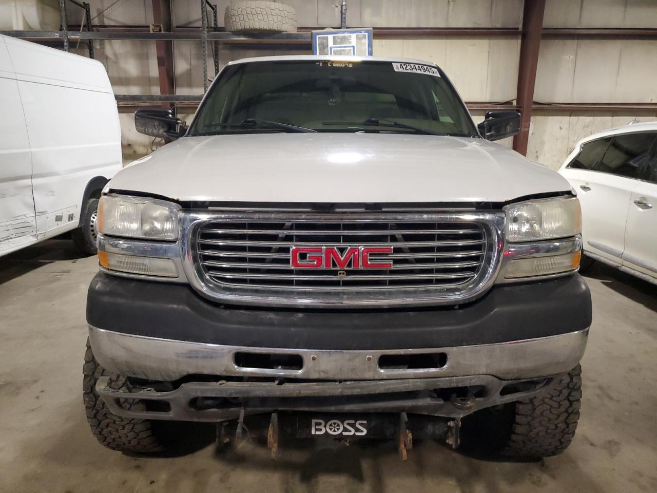 2002 GMC Sierra VIN 1GTHK231X2F180763 Copart auction photo, rear end / side damage thumbnail 5