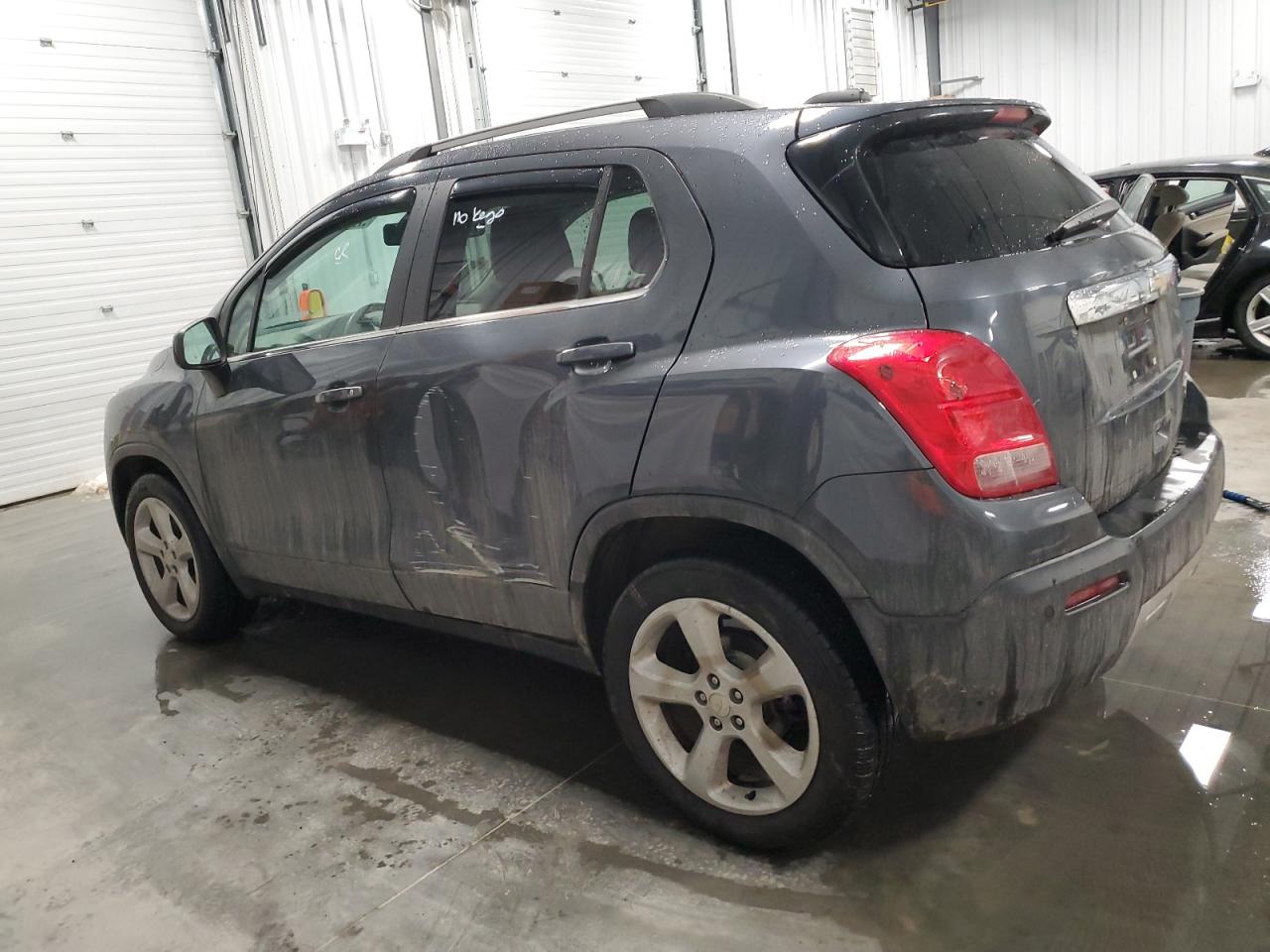 2015 Chevrolet Trax VIN 3GNCJTSB1FL219563 Copart auction photo, side / rear end damage thumbnail 2