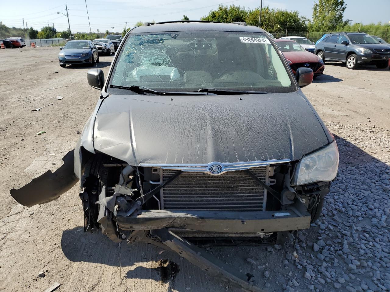 2010 Chrysler Town & Country VIN 2A4RR8DX1AR387789 Copart auction photo, front end damage thumbnail 5