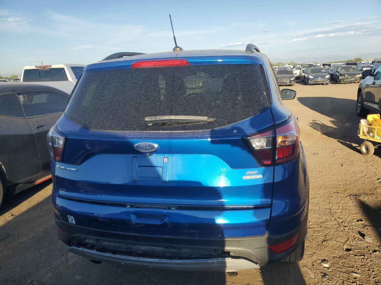 2017 Ford Escape VIN 1FMCU0GD9HUE14923 Copart auction photo, vandalism damage thumbnail 6