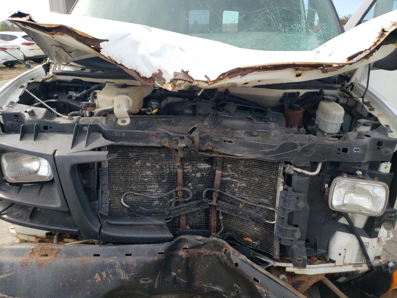 2012 GMC Savana VIN 1GTW7FCA2C1184787 Copart auction photo, front end / side damage thumbnail 11