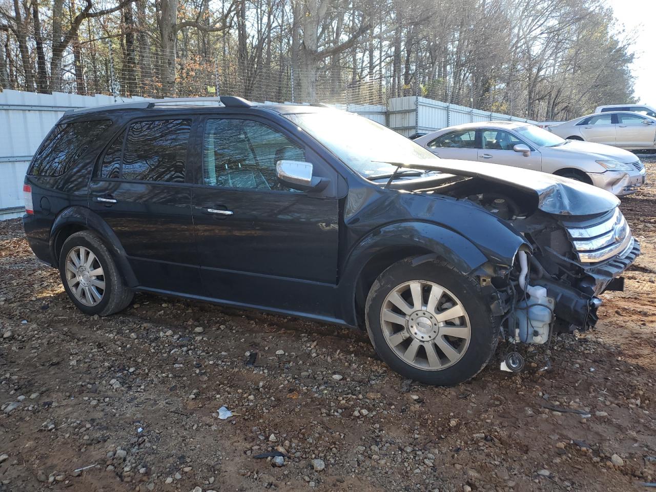 2009 Ford Taurus VIN 1FMDK06W99GA00585 Copart auction photo, front end damage thumbnail 4
