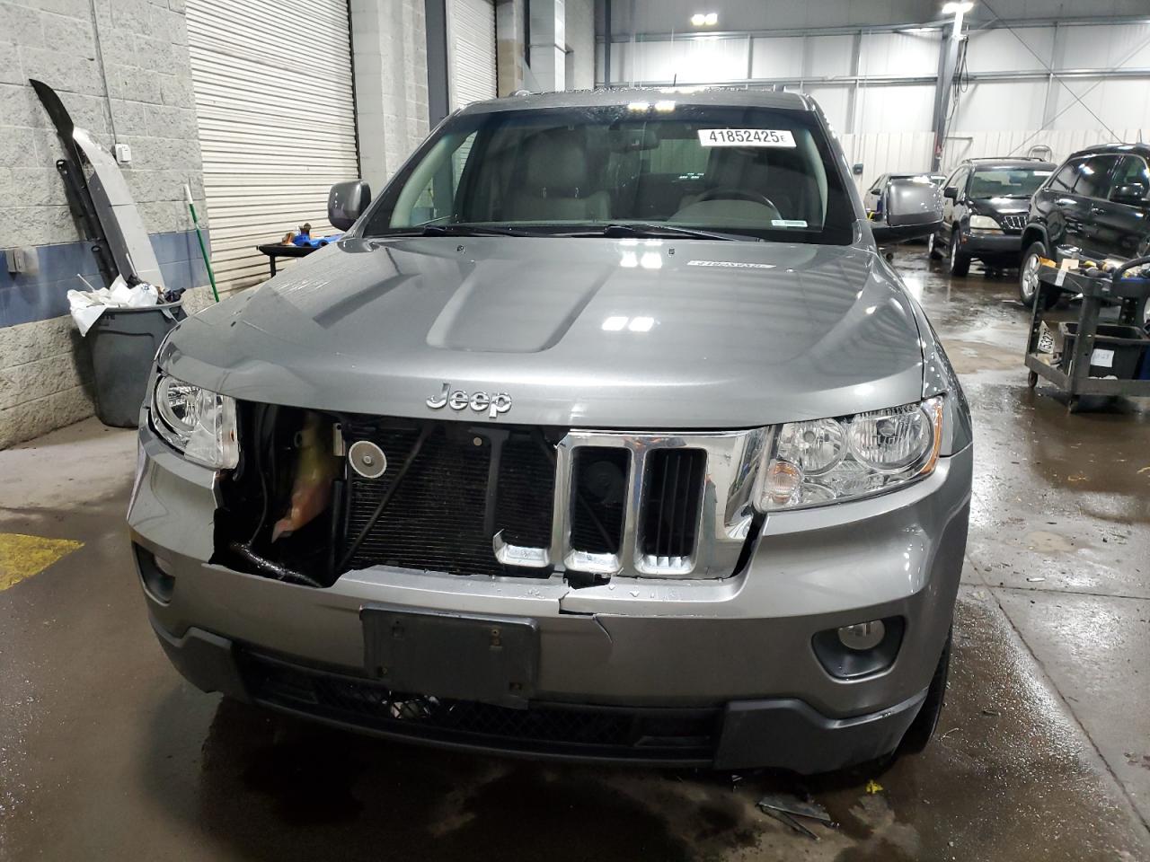 2012 Jeep Grand Cherokee VIN 1C4RJFAGXCC197166 Copart auction photo, front end damage thumbnail 5