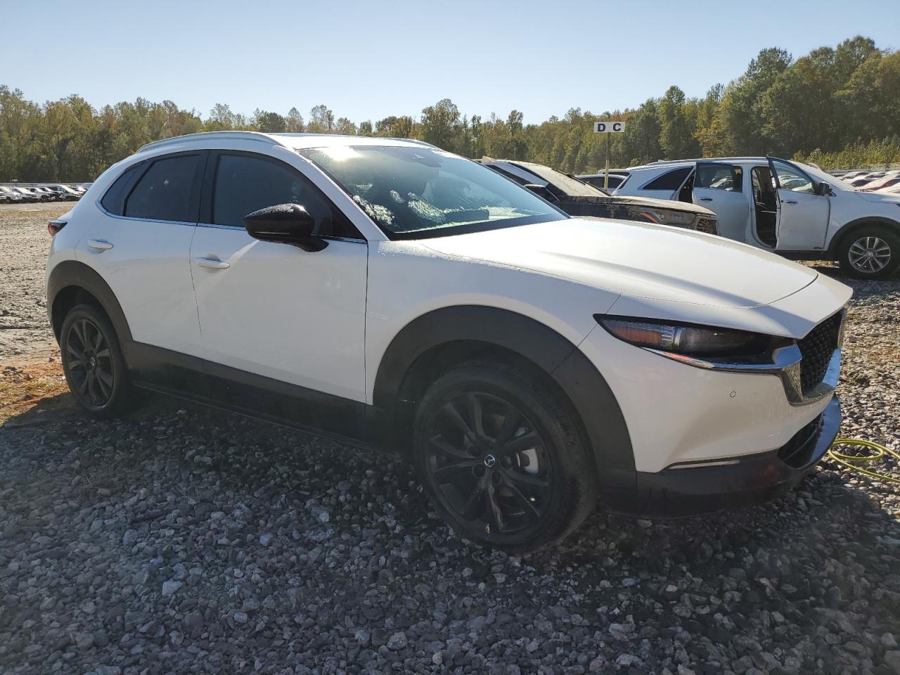 2022 Mazda CX-30 VIN 3MVDMBEY2NM446847 Copart auction photo, water/flood damage thumbnail 4