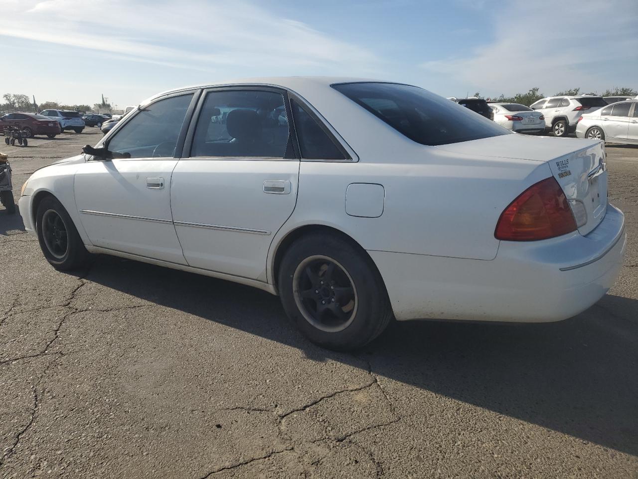 2000 Toyota Avalon VIN 4T1BF28B2YU059866 Copart auction photo, front end / rear end damage thumbnail 2