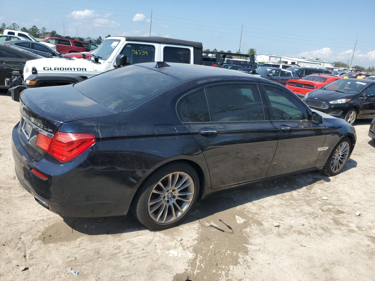 2012 BMW 7er VIN WBAKC8C54CC436677 Copart auction photo, water/flood damage thumbnail 3