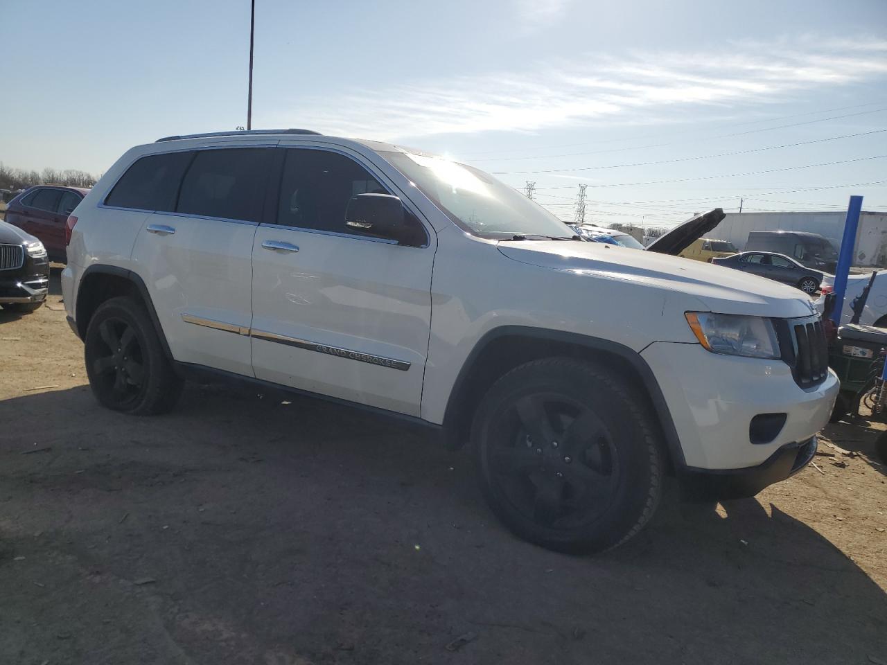 2011 Jeep Grand Cherokee VIN 1J4RR6GT1BC605690 Copart auction photo, front end / mechanical damage thumbnail 4