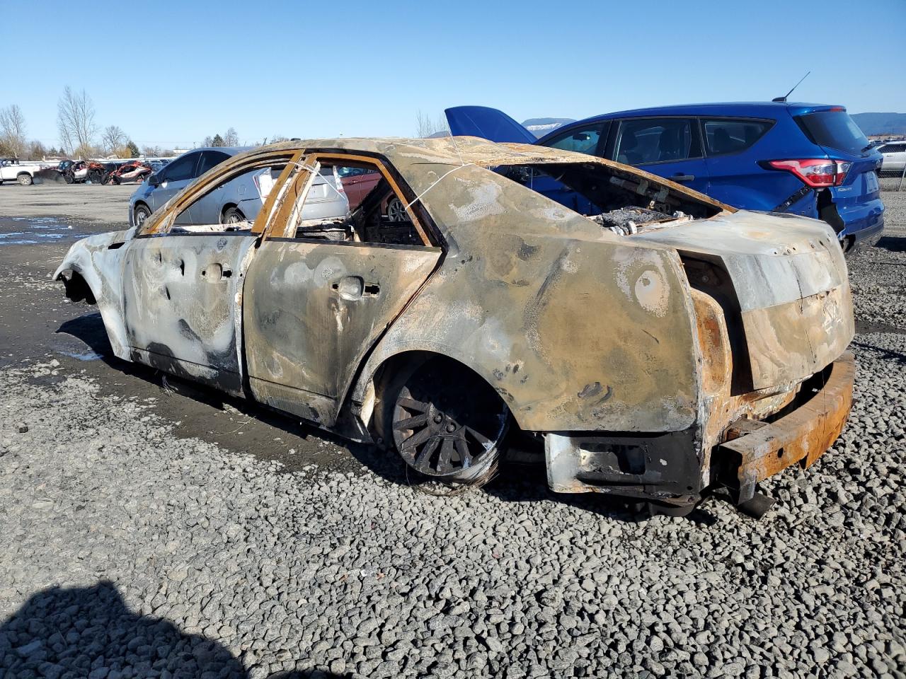 2010 Cadillac CTS VIN 1G6DA5EG4A0125945 Copart auction photo, burn damage thumbnail 2