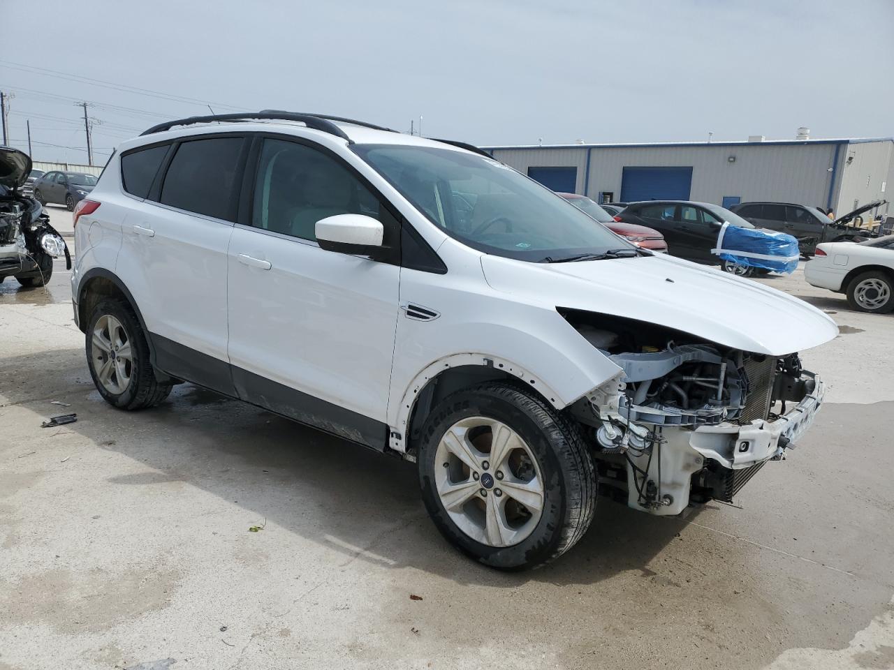 2015 Ford Escape VIN 1FMCU9GX6FUC28560 Copart auction photo, front end / minor dent/scratches damage thumbnail 4