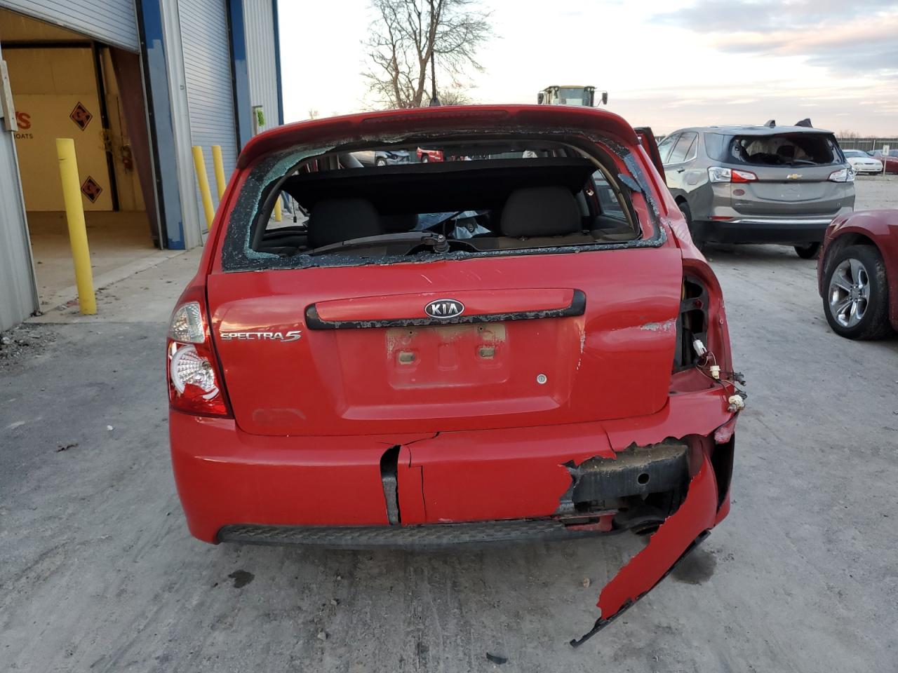 2009 KIA Spectra VIN KNAFE241295023187 Copart auction photo, all over damage thumbnail 6