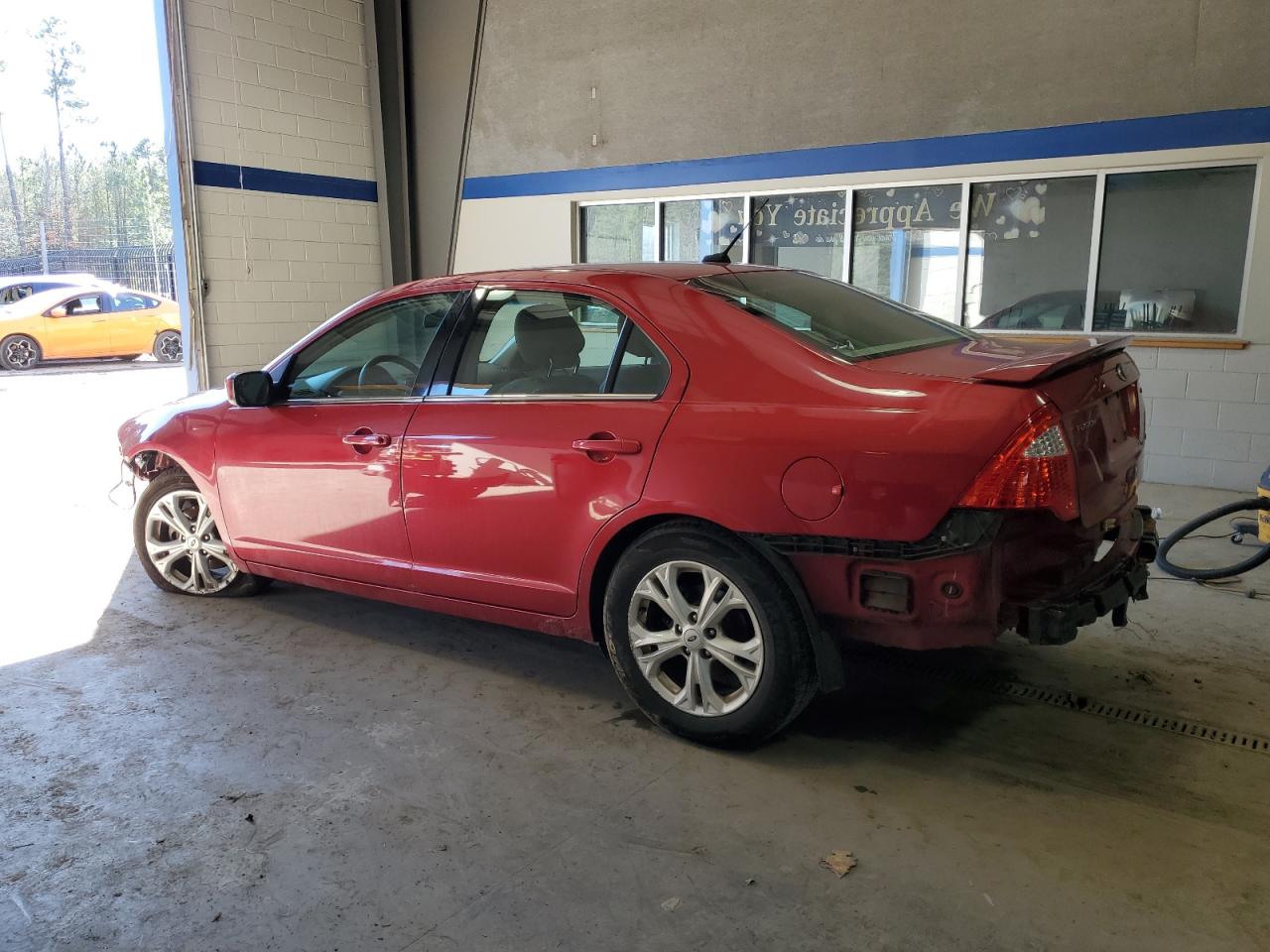 2012 Ford Fusion VIN 3FAHP0HA6CR299449 Copart auction photo, front end / rear end damage thumbnail 2