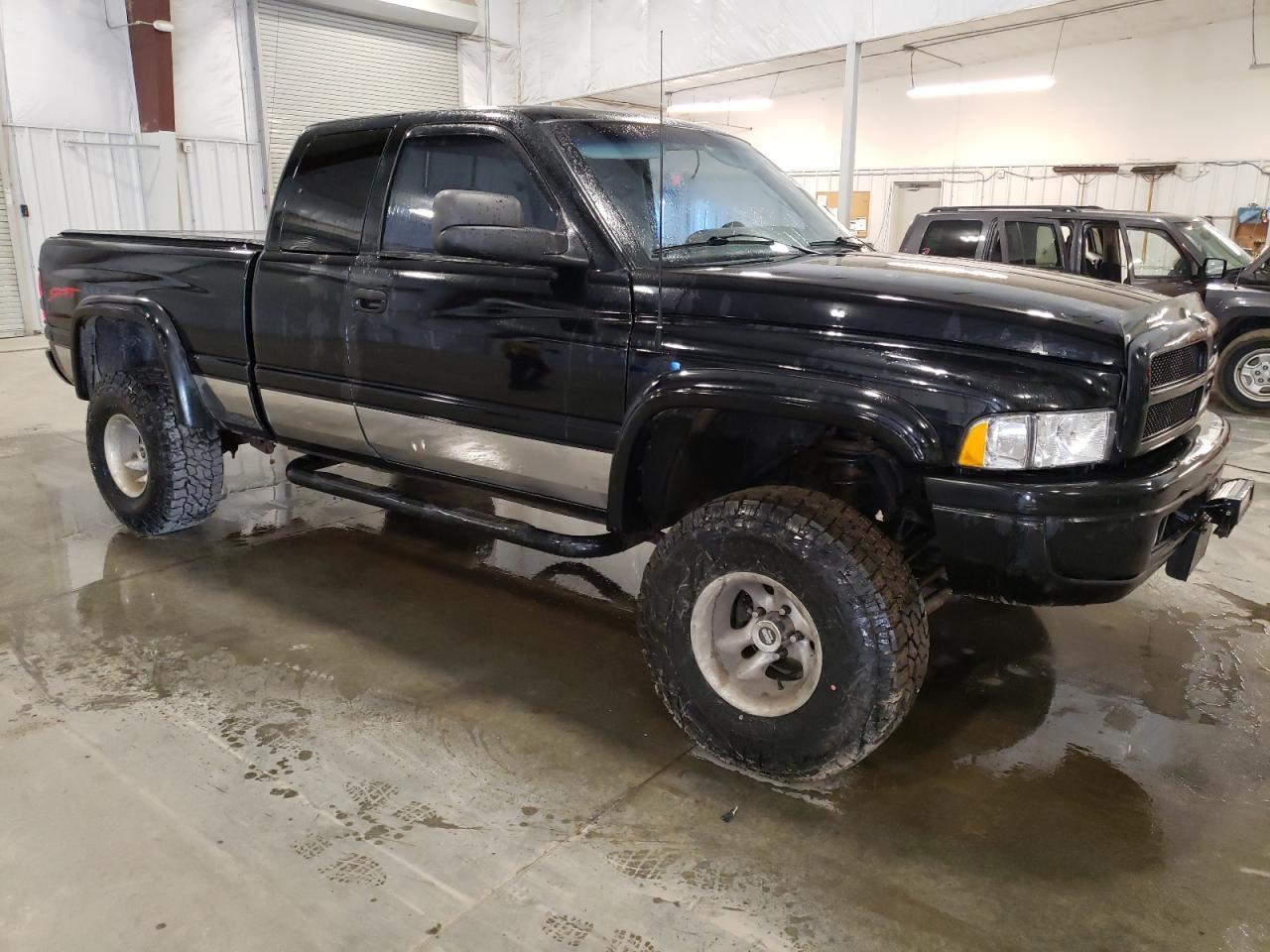 1997 Dodge RAM VIN 3B7HF13Z1VG731220 Copart auction photo, side / front end damage thumbnail 4