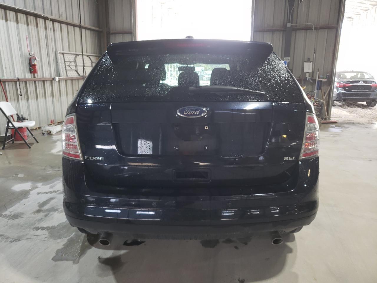 2009 Ford Edge VIN 2FMDK38C39BA67937 Copart auction photo, front end / minor dent/scratches damage thumbnail 6