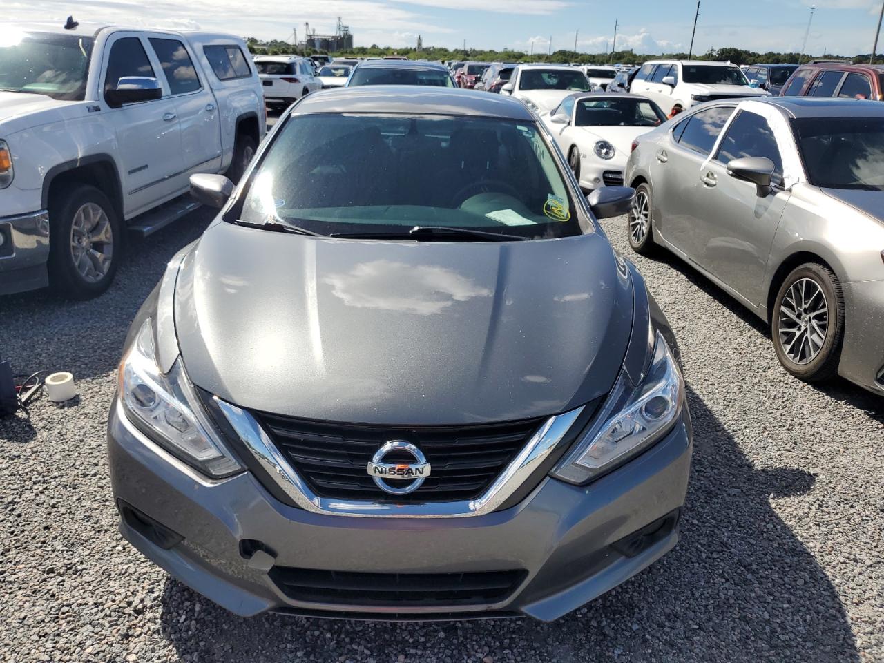 2017 Nissan Altima VIN 1N4AL3AP4HN324839 Copart auction photo, water/flood damage thumbnail 5