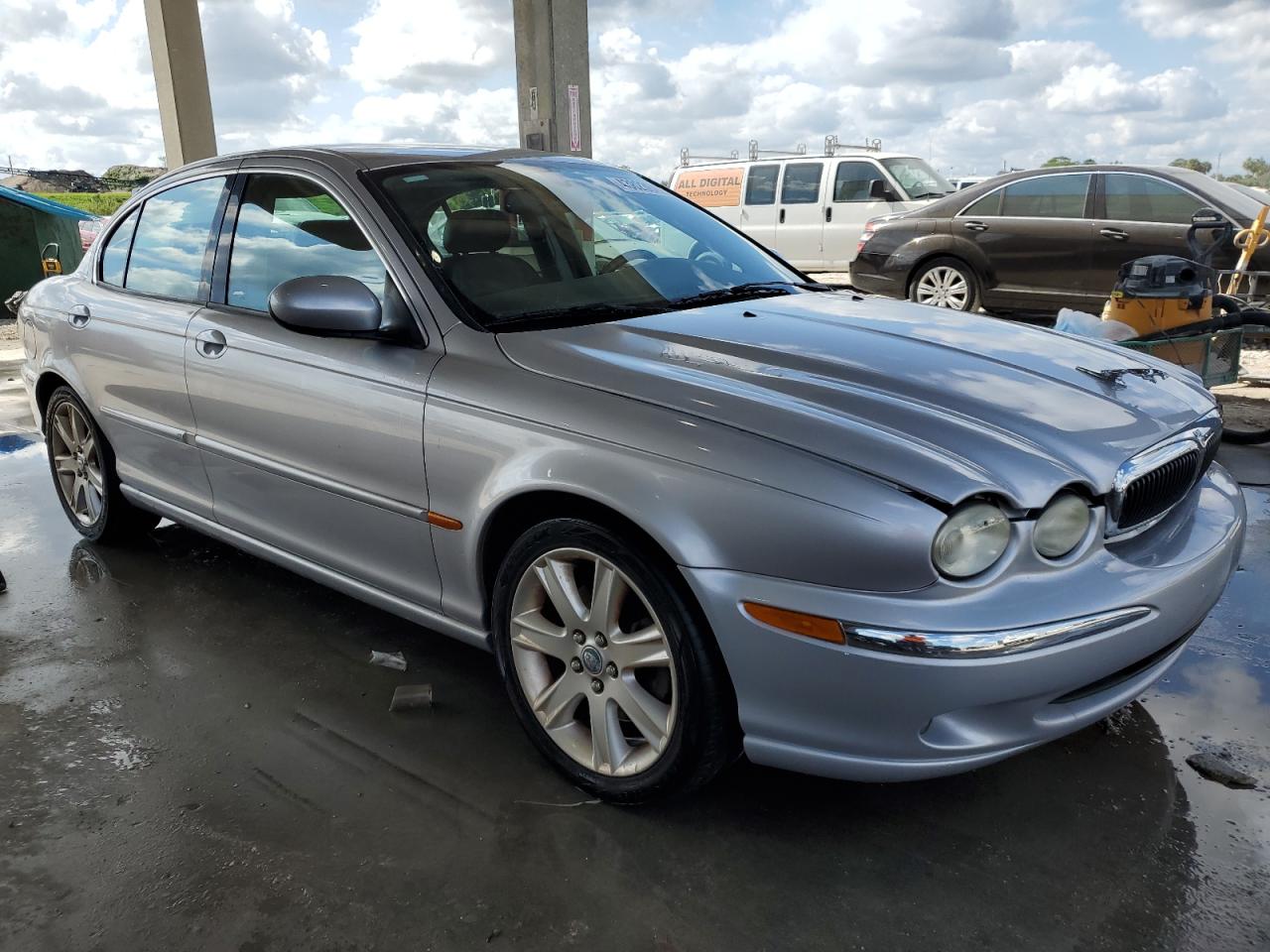 2003 Jaguar X-Type VIN SAJEA51CX3WD00336 Copart auction photo, rear end / minor dent/scratches damage thumbnail 4