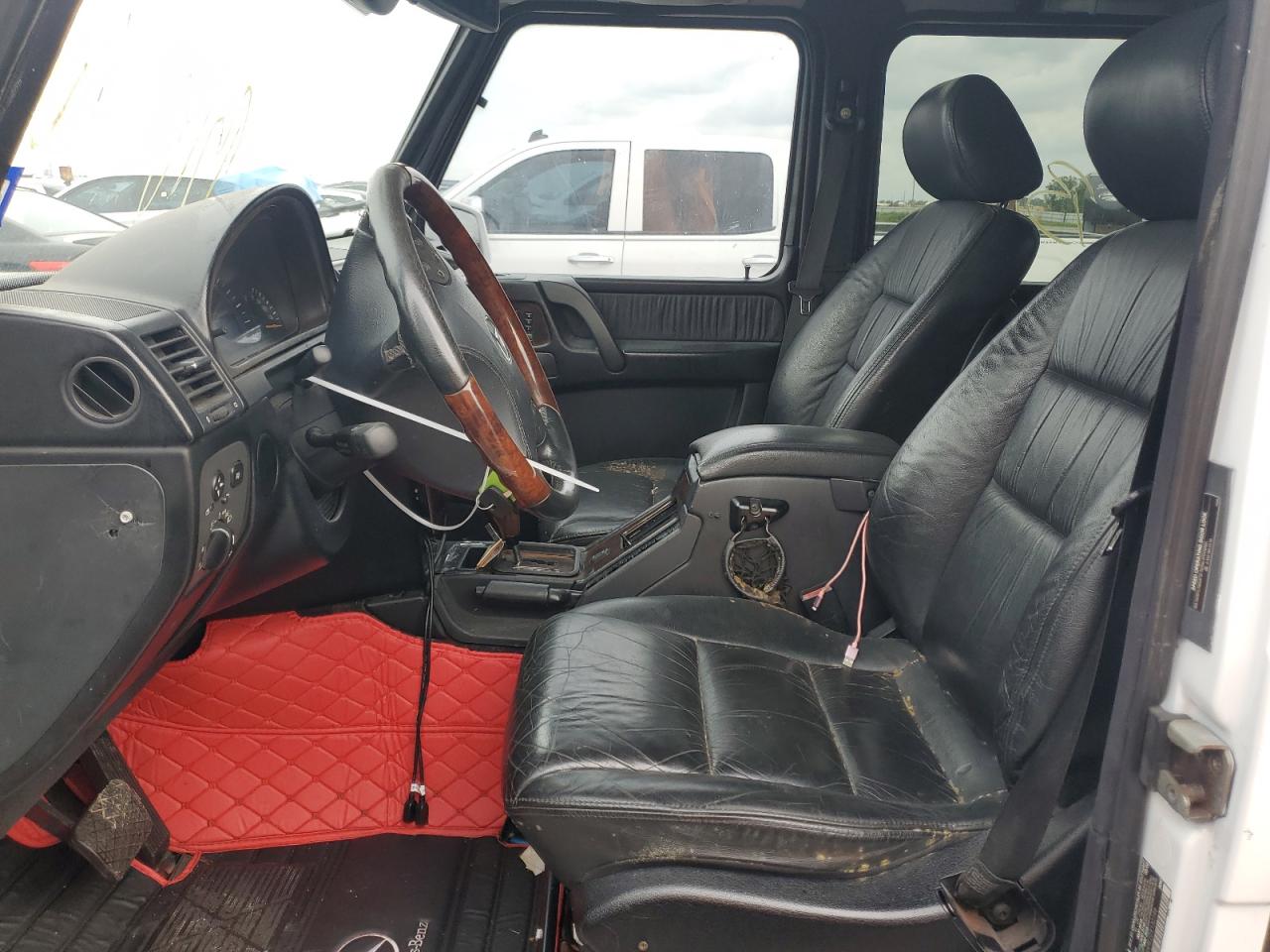 2002 Mercedes-Benz G-klasse VIN WDCYR49E22X132146 Copart auction photo, water/flood damage thumbnail 7