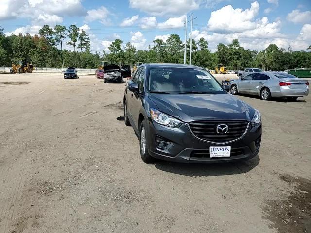 2016 Mazda CX-5 VIN JM3KE2CY0G0907906 Copart auction photo, rear end damage thumbnail 12