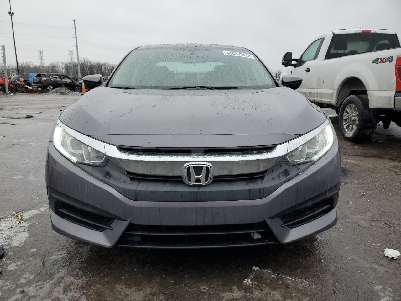 2018 Honda Civic VIN 19XFC2F55JE011987 Copart auction photo, rear end damage thumbnail 5