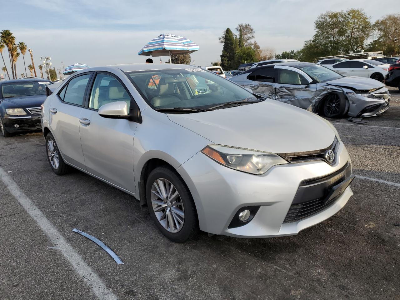 2015 Toyota Corolla VIN 5YFBURHE5FP212182 Copart auction photo, rear end / minor dent/scratches damage thumbnail 4