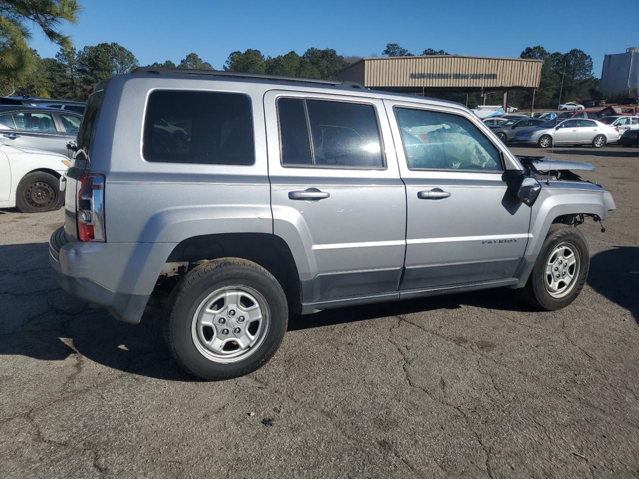 2015 Jeep Liberty (Patriot) VIN 1C4NJPBBXFD399141 Copart auction photo, front end / side damage thumbnail 3