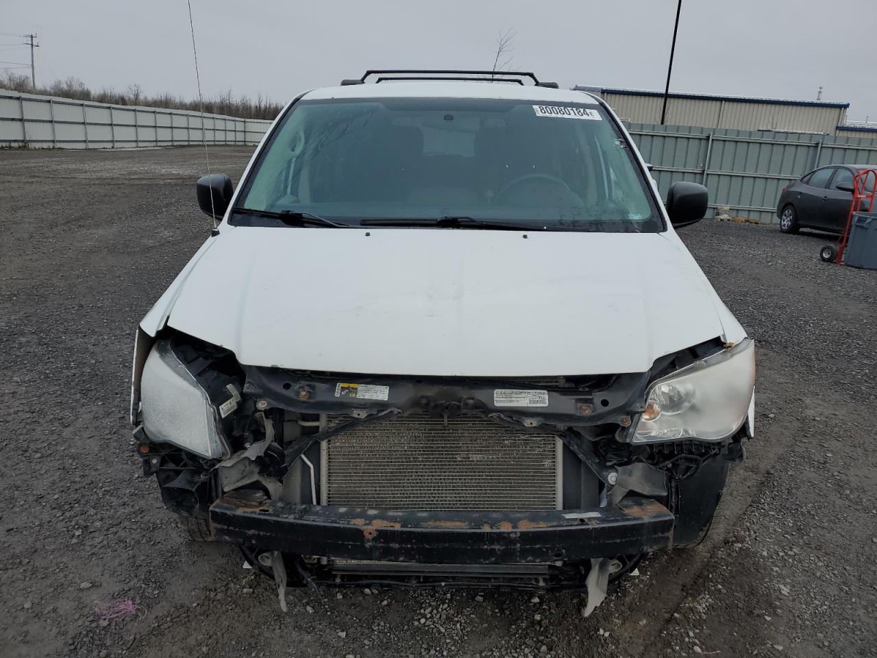 2016 Dodge Caravan VIN 2C4RDGBG1GR142744 Copart auction photo, front end / minor dent/scratches damage thumbnail 5