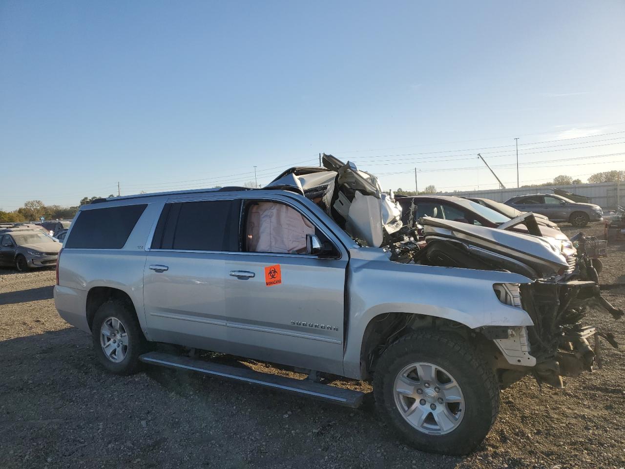 2015 Chevrolet Suburban VIN 1GNSKKKC0FR632594 Copart auction photo, front end damage thumbnail 4