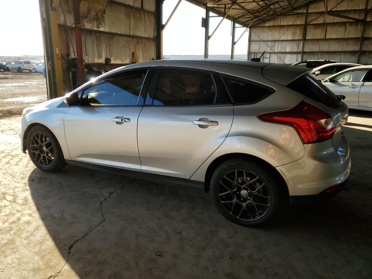 2012 Ford Focus VIN 1FAHP3N23CL305009 Copart auction photo, minor dent/scratches damage thumbnail 2