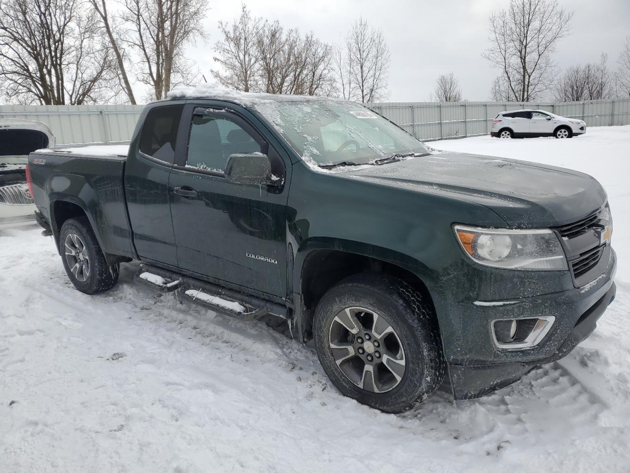 2015 Chevrolet Colorado VIN 1GCHTCE31F1130189 Copart auction photo, rear end damage thumbnail 4