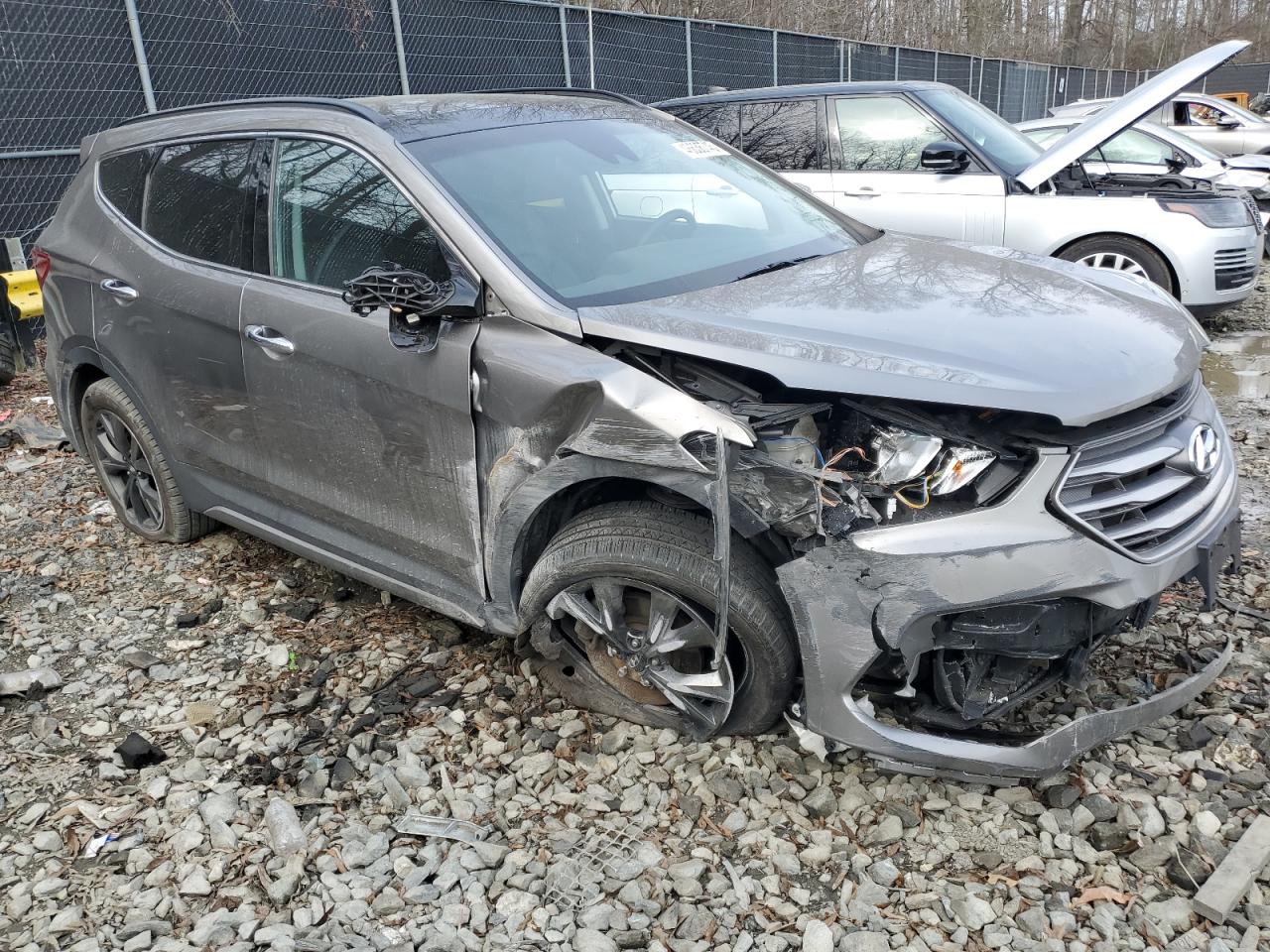 2017 Hyundai Santa Fe VIN 5XYZWDLA4HG470314 Copart auction photo, front end / side damage thumbnail 4