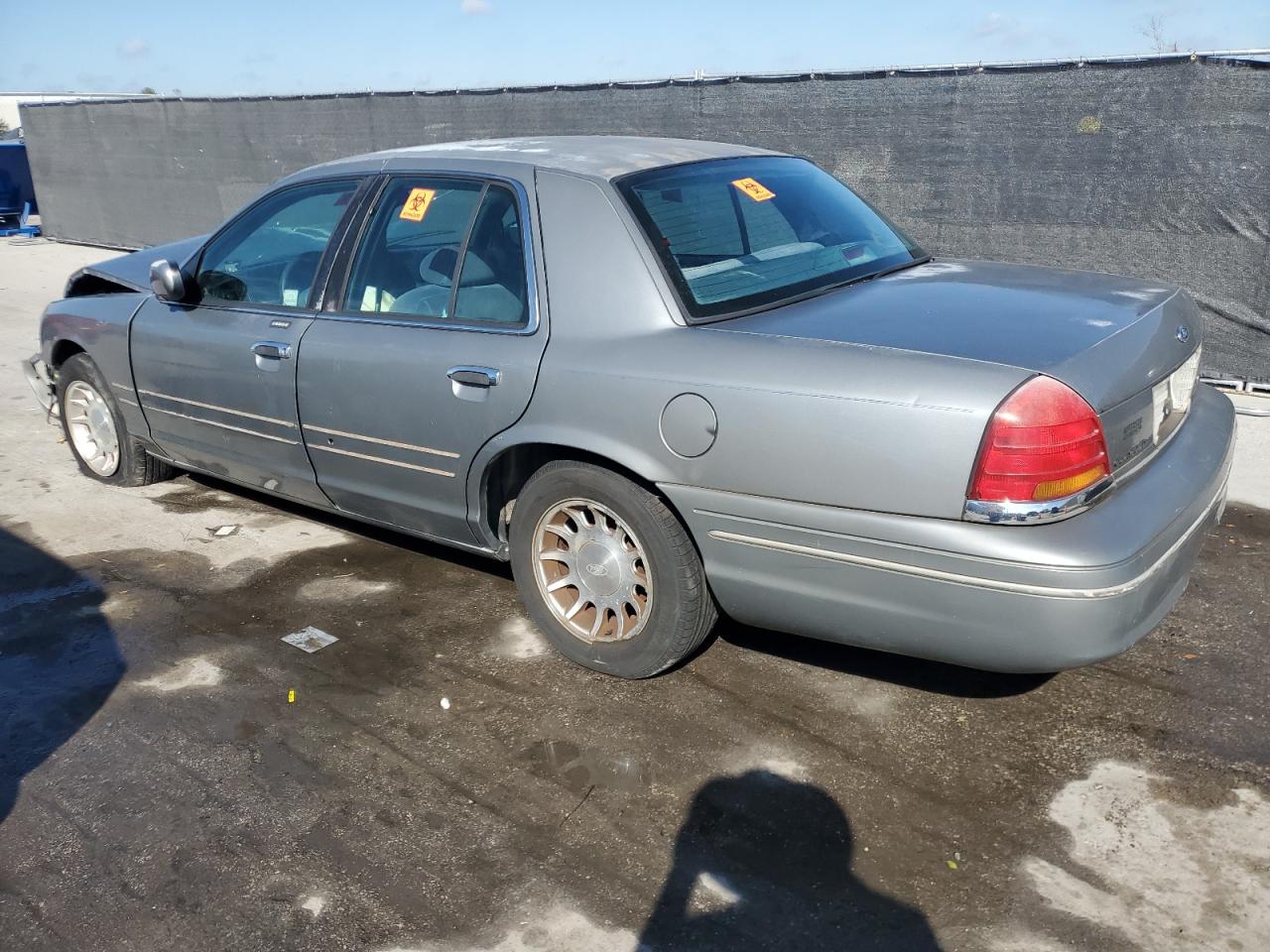 1999 Ford Crown Victoria VIN 2FAFP74W6XX235761 Copart auction photo, front end / side damage thumbnail 2