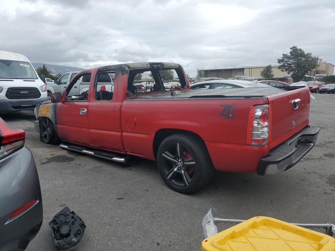 2005 Chevrolet Silverado VIN 1GCEC19XX5Z228724 Copart auction photo, burn damage thumbnail 2