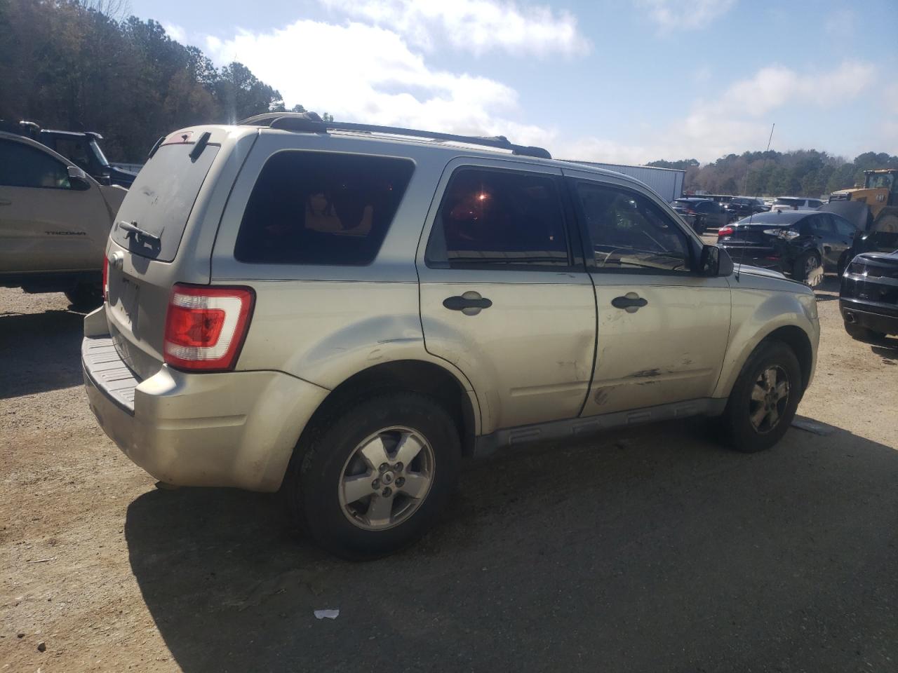 2011 Ford Escape VIN 1FMCU0C75BKB01547 Copart auction photo, side damage thumbnail 3